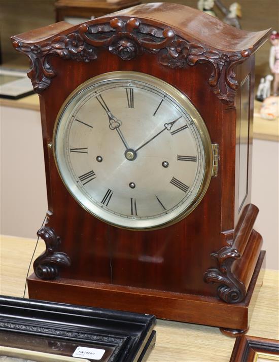 A Victorian mahogany repeating bracket clock having silvered Roman dial, striking and chiming on gong height 45cm